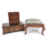 A mahogany table top chest, reconstructed, elements 19th century, with four small drawers,