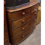 A George III mahogany bowfront chest, fitted with two short and three long drawers, on bun feet,