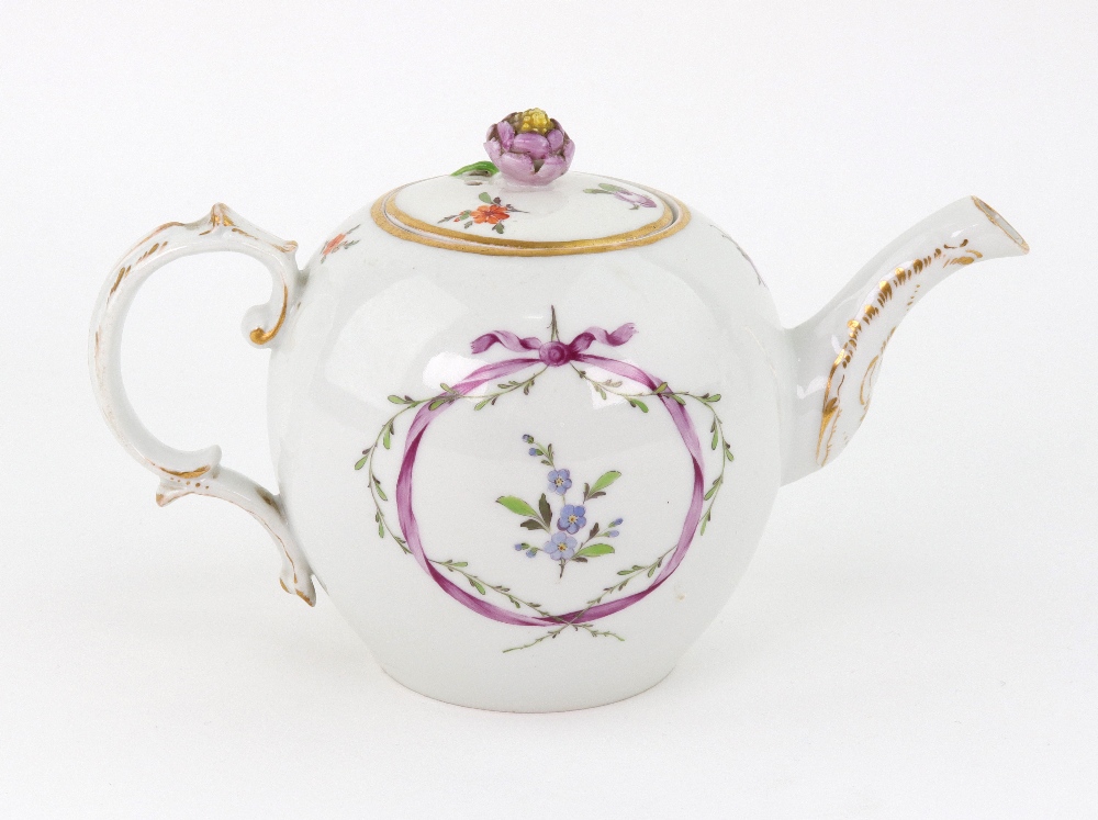 A Furstenberg porcelain bullet shape teapot, late 18th century, painted with flowers,