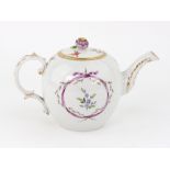 A Furstenberg porcelain bullet shape teapot, late 18th century, painted with flowers,