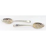 Two George III silver tablespoons later embossed in 'berry style', one George Smith,