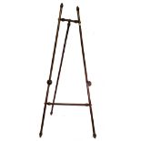 A Victorian style wooden easel, stained as mahogany, with cylindrical and turned barrel shape frame,