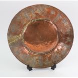 A Middle Eastern circular engraved copper dish, 18th / 19th century,