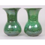 A large pair of Ruskin Pottery vases, dated 1910, swollen body with flared neck and rim,