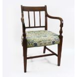 A George III mahogany open arm elbow chair,