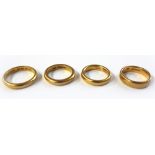 Three 22ct yellow gold wedding bands, Birmingham 1921, 1919 and London 1939,