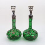 A pair of American overlaid green glass decanters, circa 1920's,
