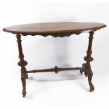 A Victorian walnut side table, circa 1870, the oval quarter burr veneered top,