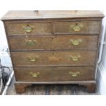 A George III oak chest, the moulded rectangular top above two short and three long drawers,