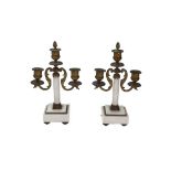 A pair of French gilt metal mounted white marble three light candelabra, late 19th century,