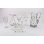 Three reproductions of 18th century English drinking glasses, four glass sugar crushers,