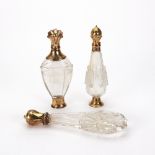 Three Dutch gold mounted cut glass perfume bottles, 19th century, of varying shapes,