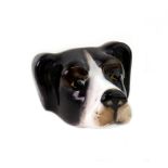 A Royal Worcester porcelain whistle, circa 1930's, modelled as a dog's head, 4.5cm wide.