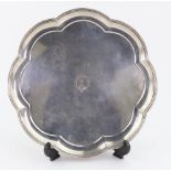 A George I style lobed circular silver salver, Mappin & Webb, Sheffield 1927, with moulded edge,