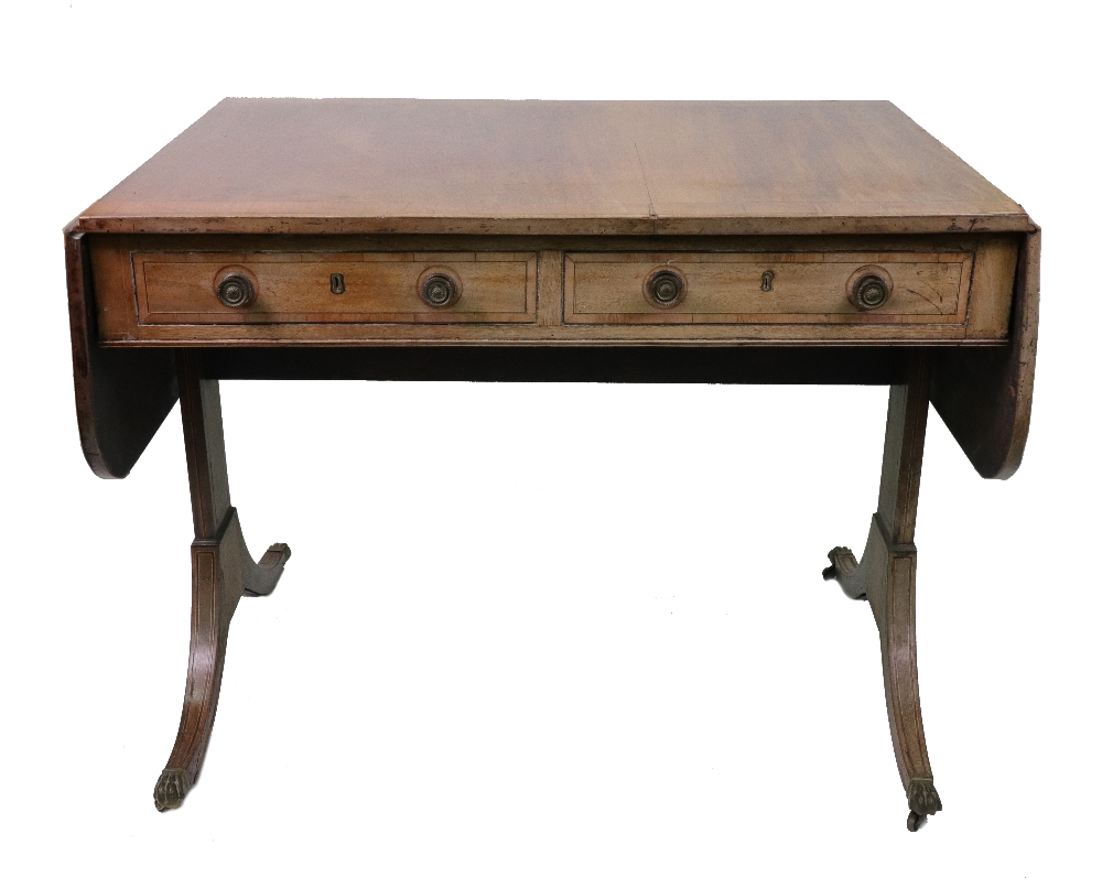 A Regency mahogany crossbanded boxwood and ebony strung sofa table,