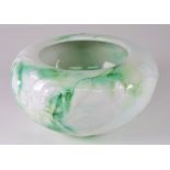 A Royal Doulton Chinese Jade bowl by Charles Noke and Harry Nixon of compressed circular form,