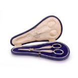 A cased pair of silver grape shears, Mappin & Webb, Sheffield 1936, ribbon tied thread edge pattern,