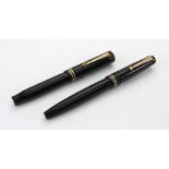 A vintage Parker Victory black and gilt fountain pen and a Geo S Parker Duofold Jr Lucky Curve