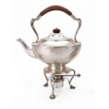 An Art Deco silver tea kettle on spirit heater stand, Goldsmiths & Silversmiths Company,