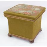 A Victorian square concave sided upholstered stool, with hinged floral Berlin needlework seat,