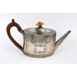 A George III oval silver teapot, Henry Chawner, London 1790, bright cut engraved,