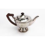 An Art Deco silver teapot, E W Haywood, Birmingham 1945,