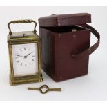 A brass cased carriage clock, late 19th century, with push repeat striking on a bell,