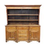 A George III oak and mahogany dresser, the boarded shelved rack with a lozenge,