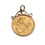 An Elizabeth II half sovereign 1982, in a 9ct gold pendant mount.