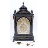 A late Victorian ebonised gilt metal mounted bracket clock and bracket, in mid 18th century style,