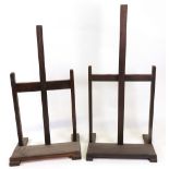 A set of four stained pine table top easels, and three others similar, or varying sizes,