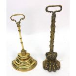A brass claw door porter or door stop, 19th century, with gadrooned handle, 39cm high,