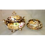 A Victorian part tea service with gilt floral shell decoration, including eleven tea cups,