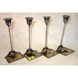 A set of four Continental silver candlestick holders, stamped Useppe Villa 800.