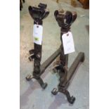 A pair of modern steel andirons,