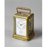 A French gilt brass carriage clock Circa 1870 In a 'one-piece' case with bevelled full glazed