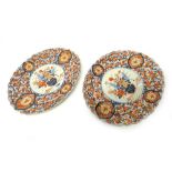 A pair of Japanese Imari oval fluted dishes, Meiji period,