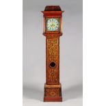 A Queen Anne walnut and arabesque marquetry longcase clock John Gammon, London,