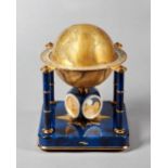 A Swiss gilt metal, silvered and blue enamel world-time compendium table timepiece By Imhof,