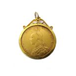 A Victoria Jubilee head sovereign 1892 M, in a 9ct gold pendant mount, combined weight 9.4 gms.