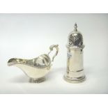 A silver sugar caster, of tapered cylindrical stylized lighthouse form, Sheffield 1979,