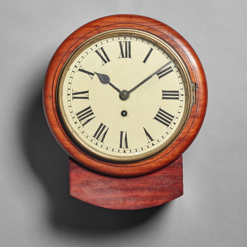 A small mahogany drop-dial timepiece Circa 1880 The 8in.