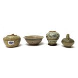 A group of South East Asian pottery, comprisng; a Thai circular box and cover, Sawankhalok,