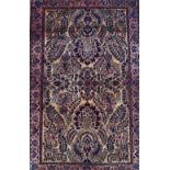 A Sarough rug, Persian, the beige field with allover sprays of flowers, central medallion,