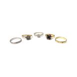 An 18ct gold, garnet and diamond set cluster ring, a platinum wedding ring detailed 'PLAT',