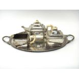 A foreign three piece tea set, comprising; a teapot, a hinge lidded sugar box and a milk jug,