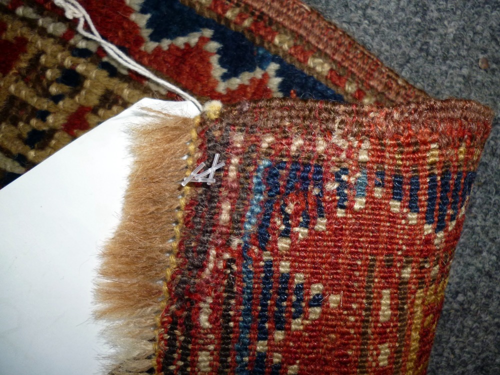 A Karachor Kazak rug, Caucasian, the indigo field with two ivory squares, a madder central cross, - Image 6 of 11