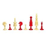 An English stained ivory chess set, 19th century, the Kings and Queens of turned form, King 10.5cm.