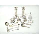 Silver and silver mounted wares, comprising; a pair of candlesticks, each on a circular base,