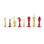 A Chinese export stained ivory chess set, 19th century, the Kings & Queens with crown finials,